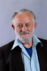 A portrait image of Roy Denney