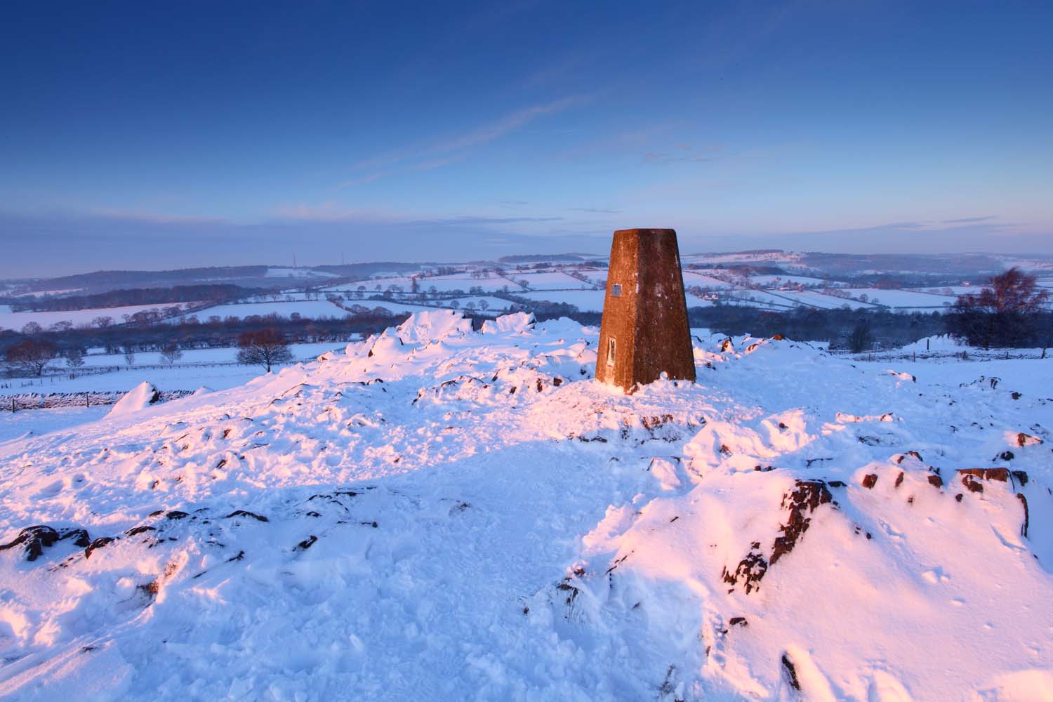 A snow-covered view of the tri point at Beacon Hill