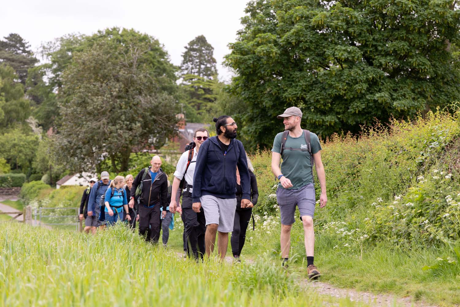 Several adults on a guided hike through Charnwood Forest