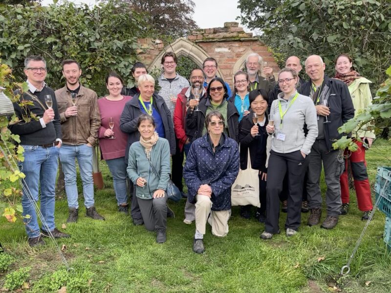 Field trip attendees gather for a glass of sparkling wine at the Rothley Wine Estate vineyards