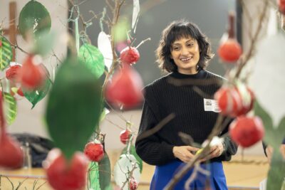 Mandeep walks among the recreated orchard.