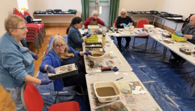 Volunteers washing archaeological finds